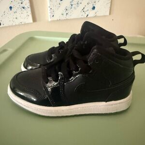 Jordan Kids Black and White High-Top Sneakers